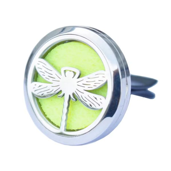 Close‑up of Dragonfly car diffuser locket open, showing felt pad inside ready for essential oil drops.