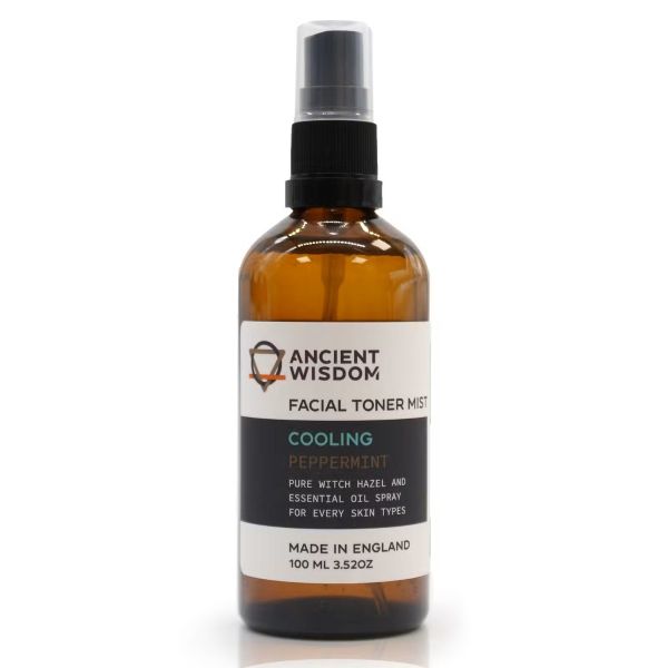 Brown 100ml spray bottle of Witch Hazel with Peppermint Facial Toner Mist, with white label and black nozzle.