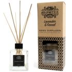 Lavender and Fennel Reed Diffuser in a clear glass bottle with natural rattan sticks, photographed against a neutral background.