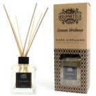 Lemon Verbena Reed Diffuser in a clear glass bottle with rattan sticks, displayed alongside its decorative branded box.
