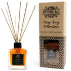 Ylang Ylang & Mandarin Reed Diffuser in a clear glass bottle with rattan sticks, displayed alongside its matching presentation box.